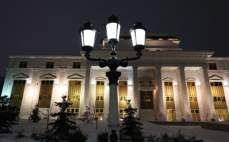 Public building facade lit at night